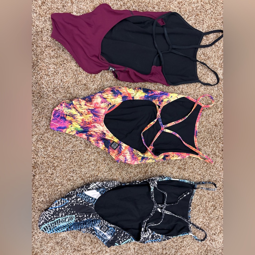 LOT OF JOLYN ONE PIECE BATHING SUITS. 3 fixed back performance suits